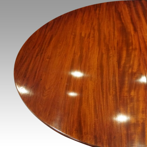 Regency style mahogany twin pedestal dining table round end
