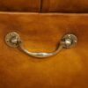 Victorian buttoned leather ottoman carrying handle