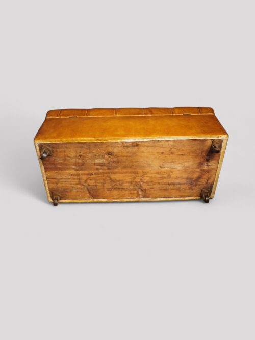 Victorian buttoned leather ottoman underside