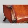 Victorian rosewood button leather library chair arm detail