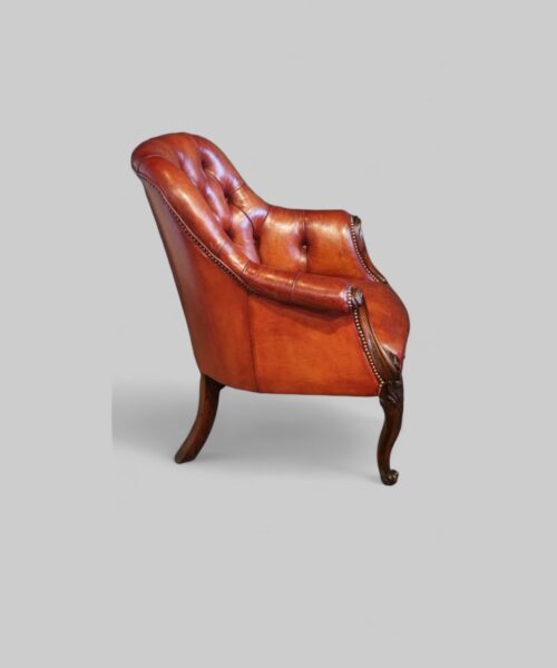 Victorian rosewood button leather library chair side view