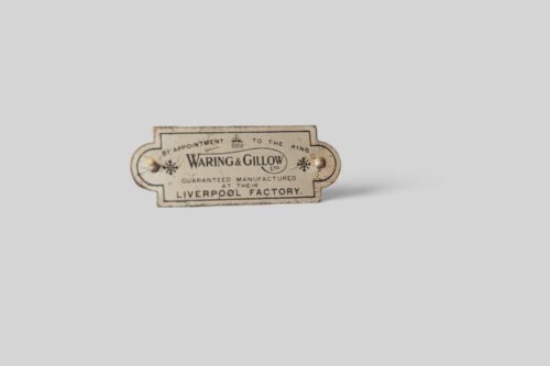 Waring and Gillows breakfront bookcase makers plate