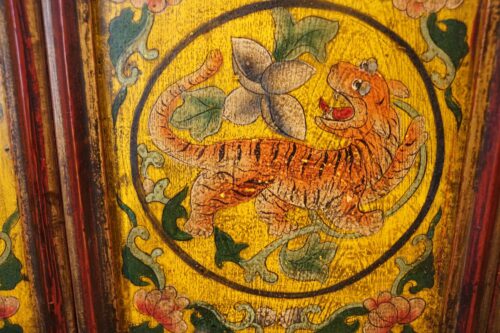 Antique Tibetan cabinet panel detail