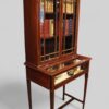 Edwardian mahogany curio cabinet and bookcase side view