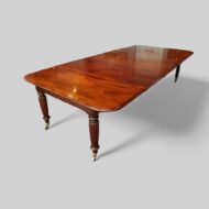 Regency mahogany extending dining table angle view