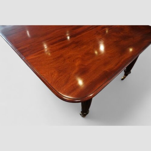 Regency mahogany extending dining table round corner