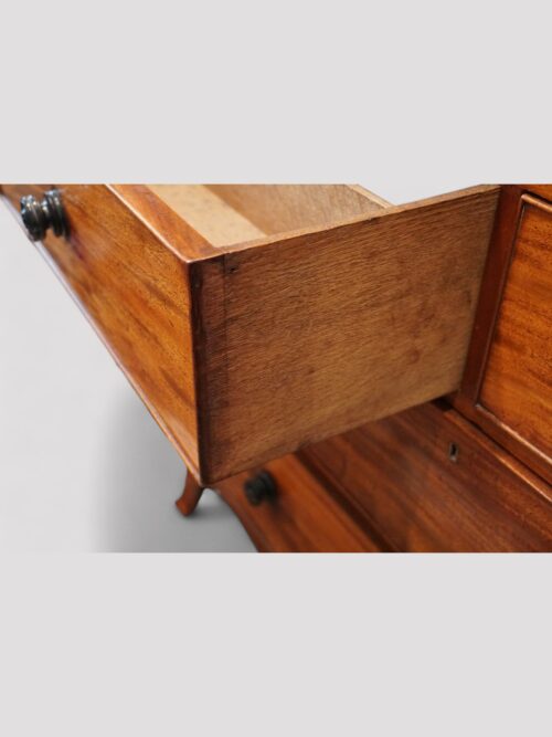 Regency mahogany linen press drawer lining