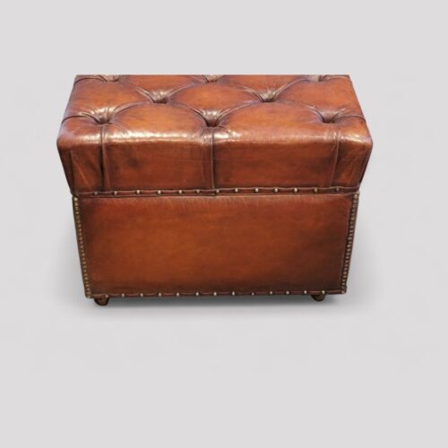 Victorian leather buttoned ottoman end