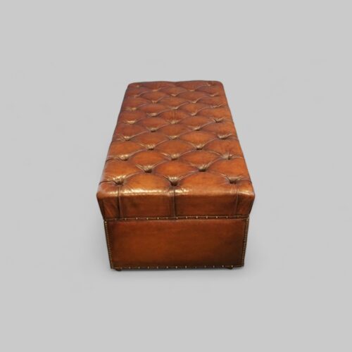 Victorian leather buttoned ottoman end view