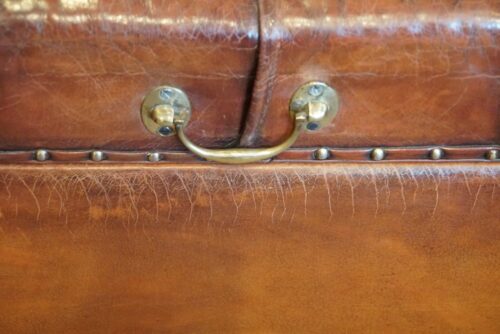 Victorian leather buttoned ottoman handle