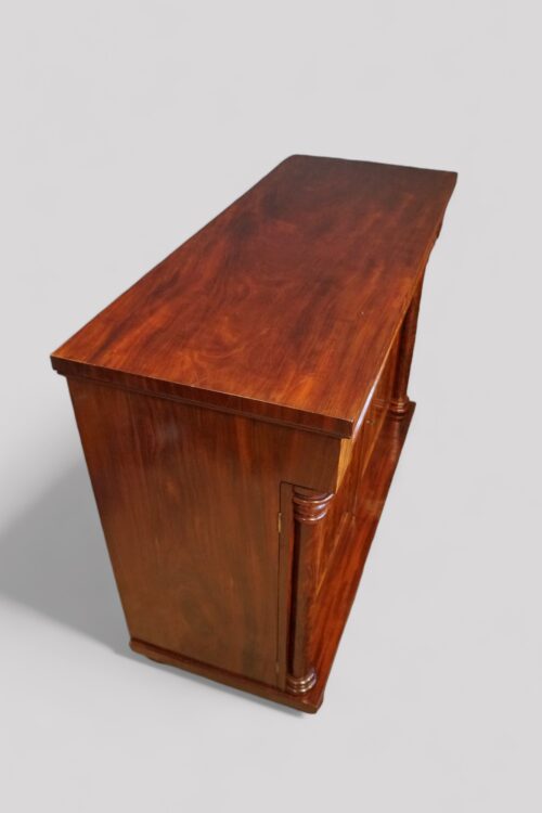 Antique mahogany chiffonier top detail