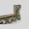 Carved teak decorated Florentine mirror corner