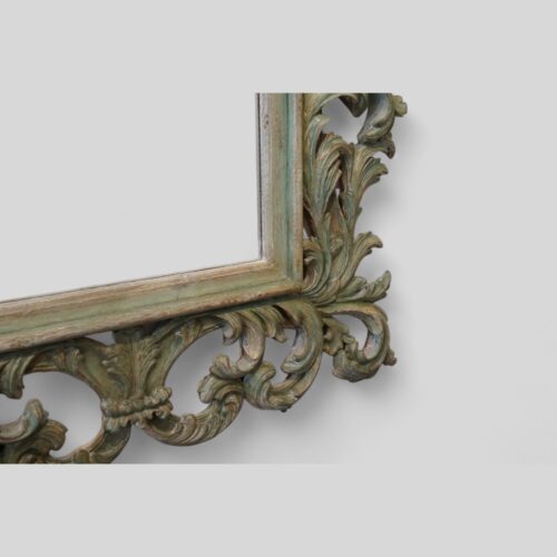 Carved teak decorated Florentine mirror corner