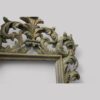 Carved teak decorated Florentine mirror top corner