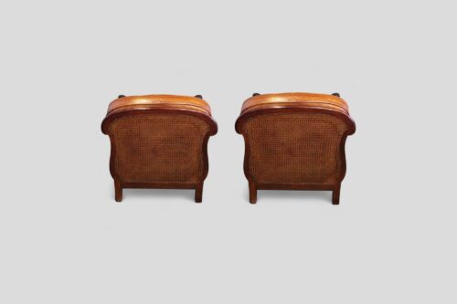 Pair of Edwardian leather club chairs rear