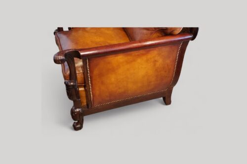 Pair of Edwardian leather club chairs side panel