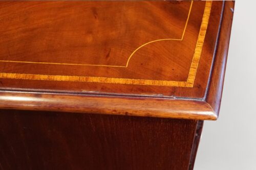 Small Georgian inlaid bow chest corner
