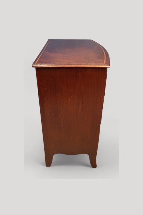 Small Georgian inlaid bow chest top detail