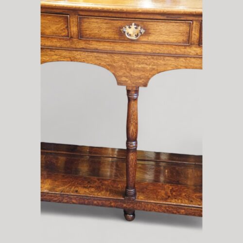 Antique oak South Wales pot board dresser centre leg