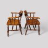 Pair of Edwardian captains chairs side view
