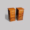 Pair of Edwardian walnut bedside chests angle