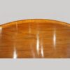 Oval mahogany cross banded dining table top detail