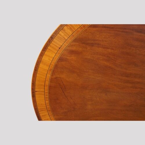 Oval mahogany cross banded dining table top detail banding
