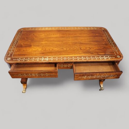 Regency brass inlaid library table drawers open