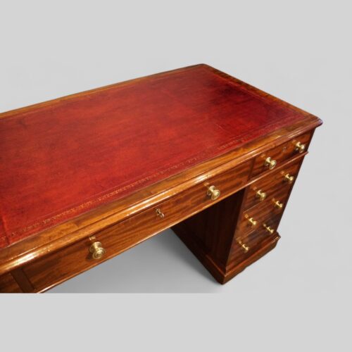 Victorian mahogany 9 drawer desk angle