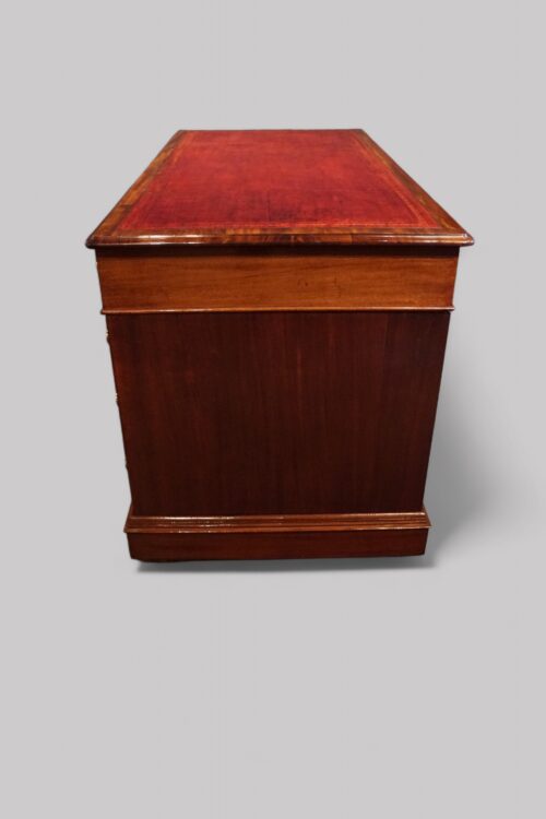 Victorian mahogany 9 drawer desk end view