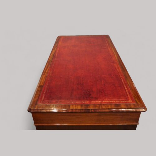 Victorian mahogany 9 drawer desk end view leather