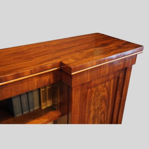 William IV mahogany breakfront bookcase top door