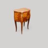 Pair of French inlaid bedside chests at angle
