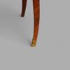 Pair of French inlaid bedside chests front leg