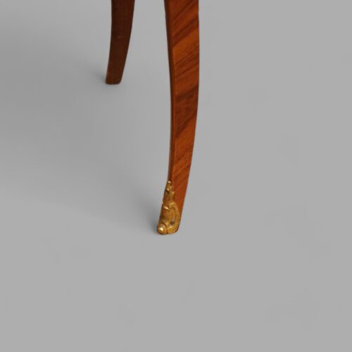 Pair of French inlaid bedside chests front leg