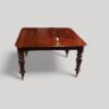 Antique mahogany extending dining table no leaves