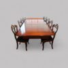 Antique mahogany extending dining table with chairs