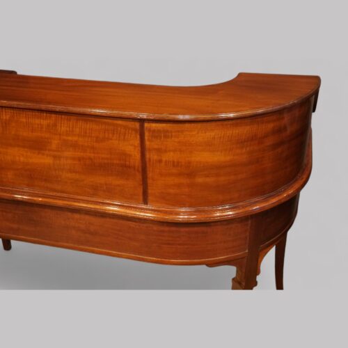 Edwardian mahogany Carlton House desk bow rear