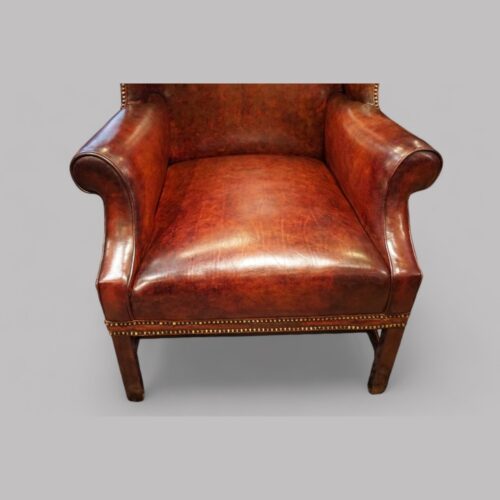 Tortoiseshell leather wing chair seat