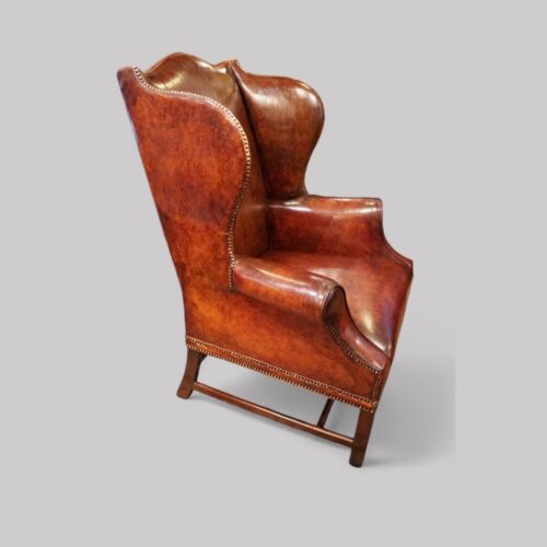 Tortoiseshell leather wing chair side view