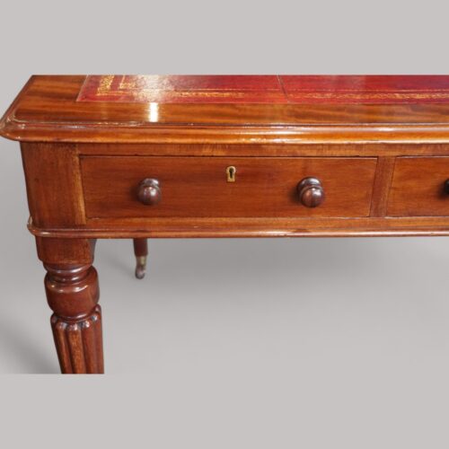 Victorian mahogany writing table drawer front