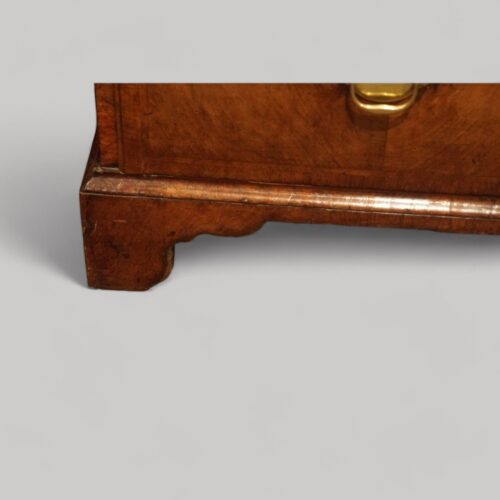 George III walnut chest on chest bracket feet