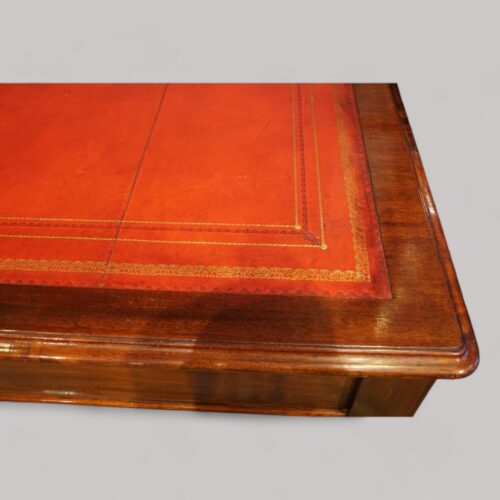 Large Victorian mahogany writing table corner