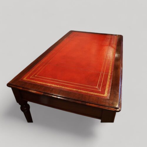 Large Victorian mahogany writing table leather top