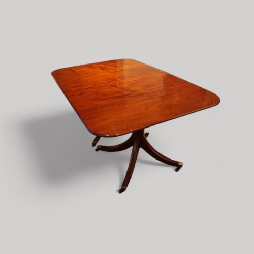 Mahogany twin pillar table closed no leaves at angle