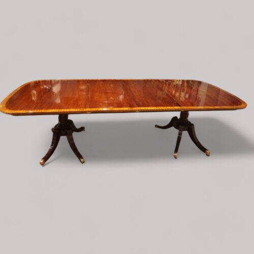 Sheraton mahogany twin pillar crossbanded dining table