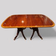 Sheraton mahogany twin pillar crossbanded dining table side view