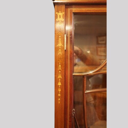 Edwardian inlaid serpentine bookcase bell flower inlay