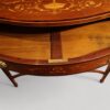 Edwardian inlaid serpentine bookcase drawer