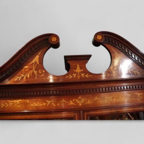 Edwardian inlaid serpentine bookcase pediment